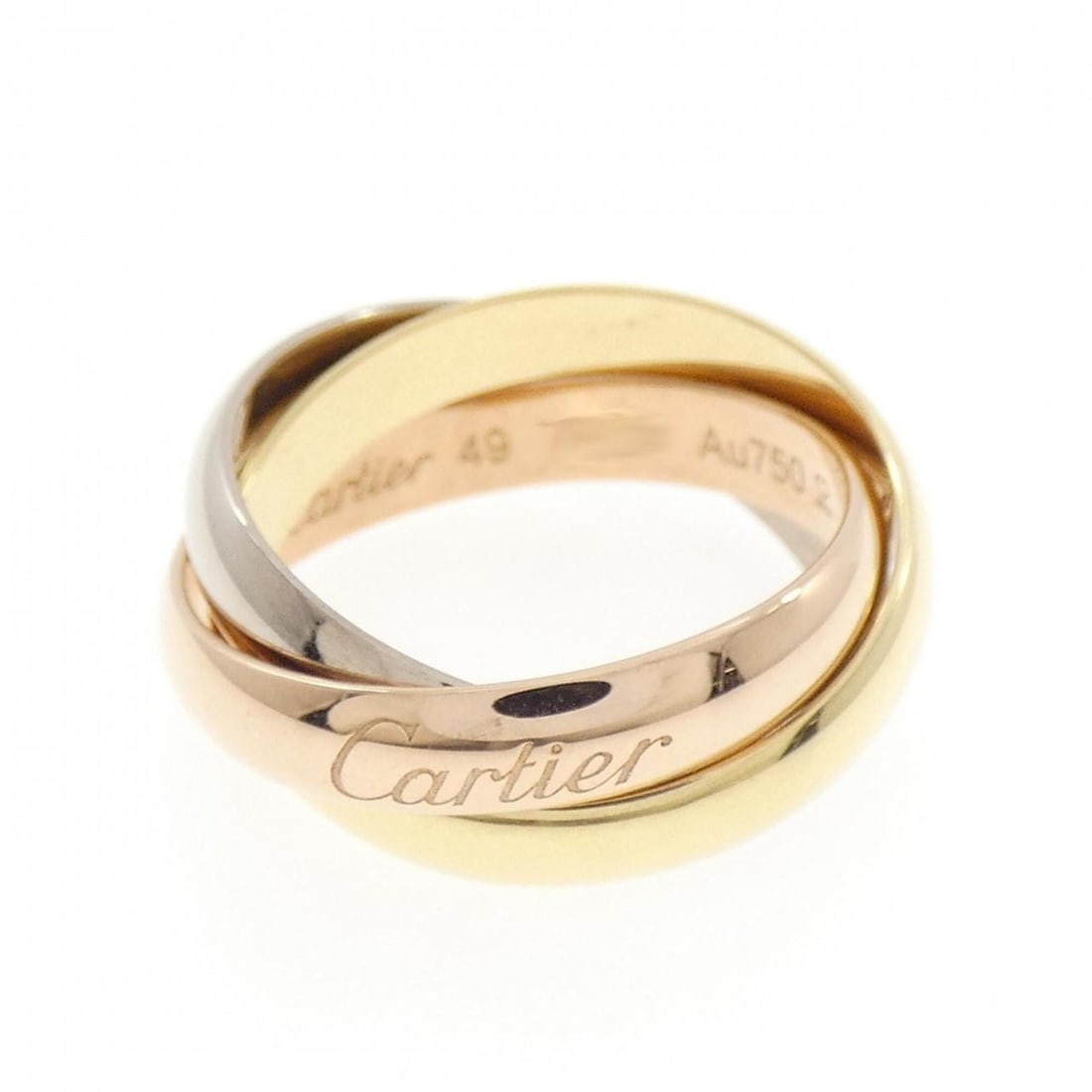 Cartier Trinity Ring: --- Catalog ---Category: SizeUS Size: 5Brand Size: 49Category: DesignType: Band ringGender: WomenMaterial: Pink gold (18K), White gold (18K), Yellow gold (18K)Category: GeneralMPN: B4052700Brand: