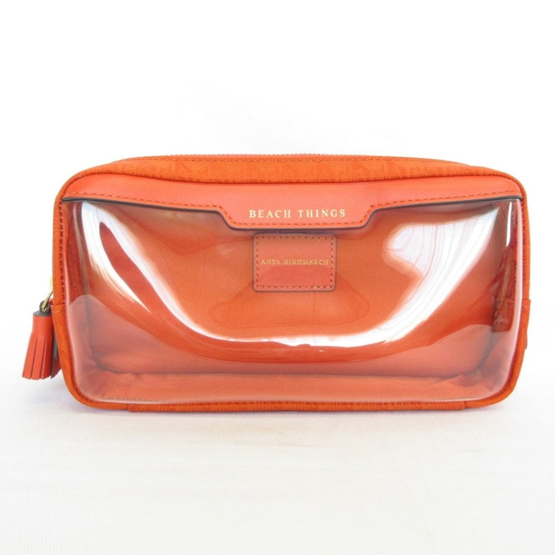ANYA HINDMARCH BEACH THINGS Pouch Clutch Bag Clear Orange Women's: --- Catalog ---Category: SizeSize (HxWxD): 11.5cm x 21cm x 6cm / 4.52'' x 8.26'' x 2.36''Category: DesignType: Clutch bagColor: Clear orangeGender: WomenCategory: GeneralBrand: Anya Hindmarch--- Item 