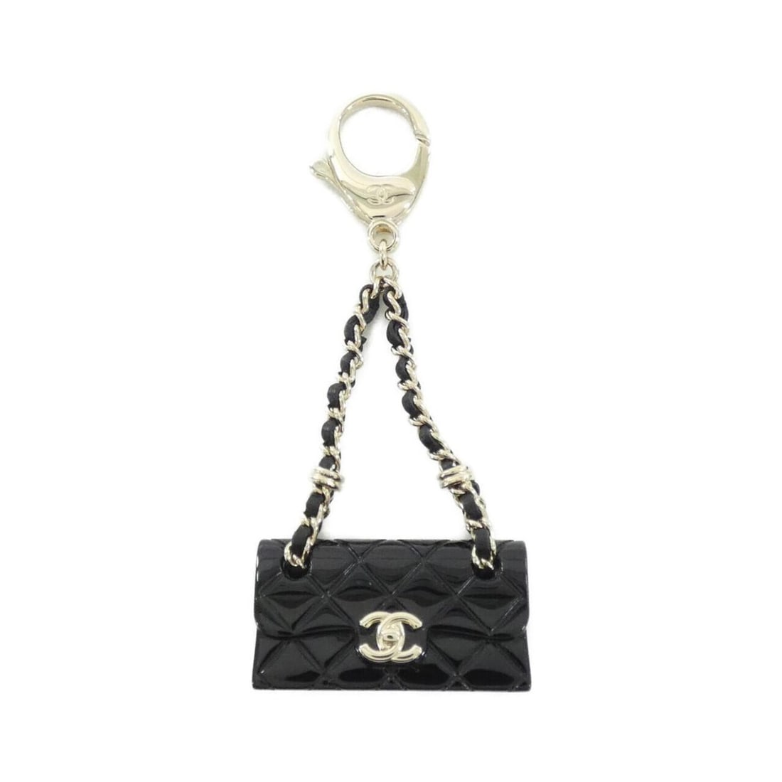 Chanel ABA121 Keychain: --- Catalog ---Category: DesignType: KeyringColor: Black, GoldGender: Men,WomenCategory: GeneralMPN: ABA121Brand: Chanel--- Item List ---Section: ConditionRanking: Rank A Used - A few traces of