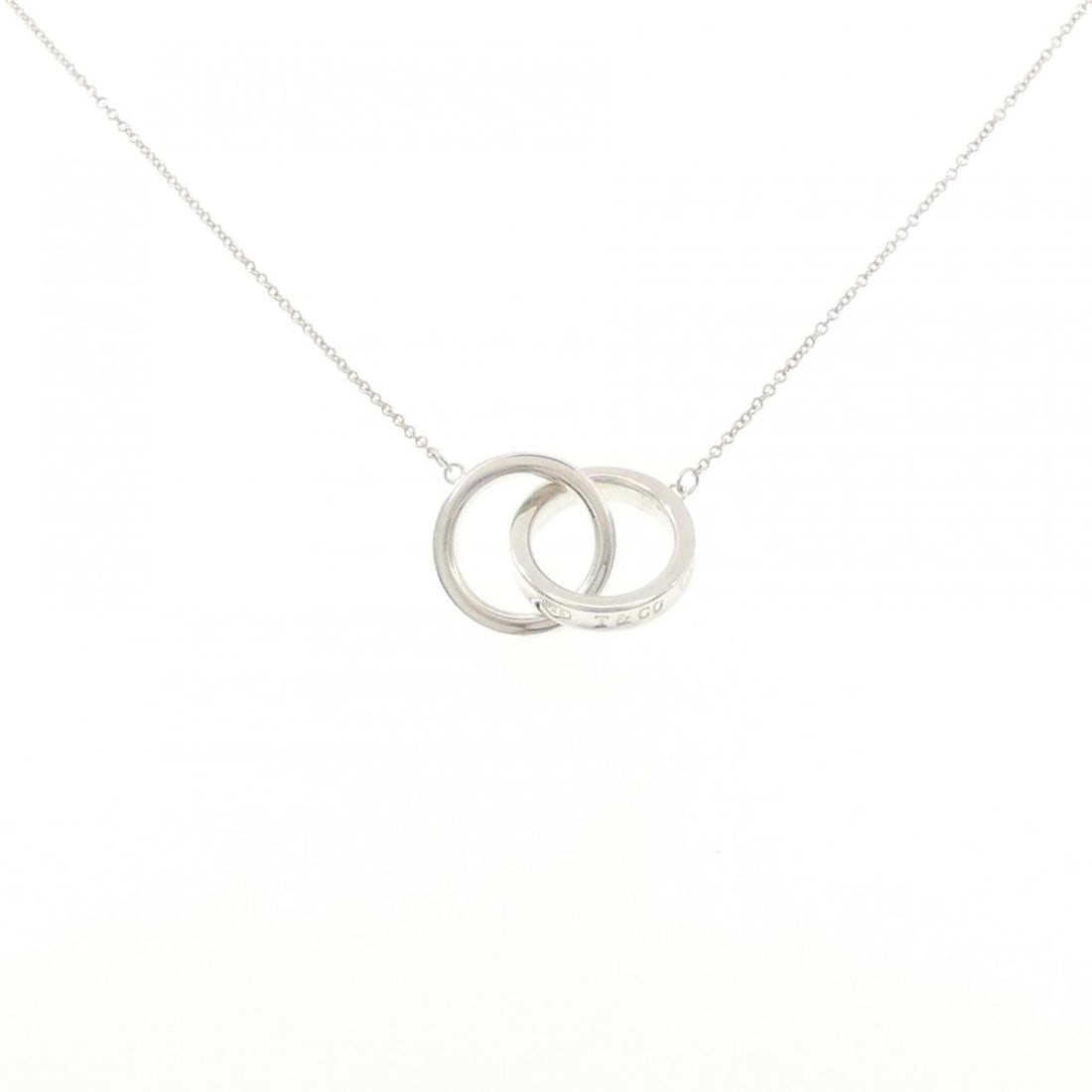 Tiffany & Co. 1837 Interlocking Circle Necklace: --- Catalog ---Category: SizePendant Size: 14.2mm x 20.7mm / 0.55'' x 0.81''Neck Circumference: 41 cm / 16.14''Category: DesignGender: WomenMaterial: Silver 925Pendant Type: PendantNecklace Type: