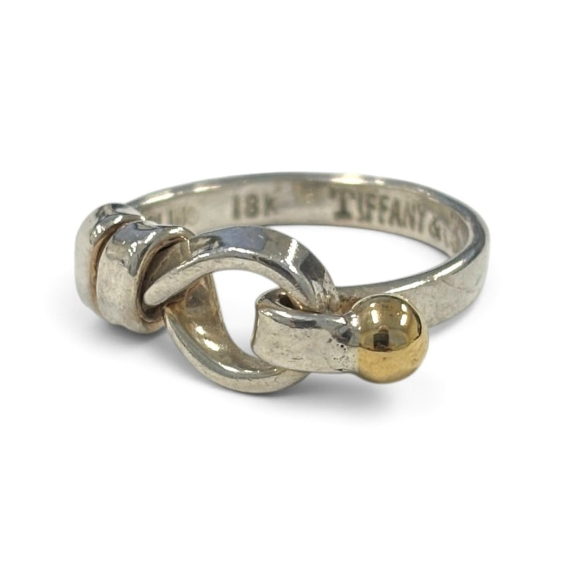 Tiffany & Co. 18K Gold and 925 Sterling Silver Hook Eye Ring, Size EU47.5, Women's.: --- Catalog ---Category: SizeWeight: 2.9g / 0.1oz.JP Size: 7.5US Size: 4Inner Diameter: 15.20mm / 0.60''Inner Circumference: 47.50mm / 1.87''Category: DesignType: Band ringMetal: Gold, SilverGender: W