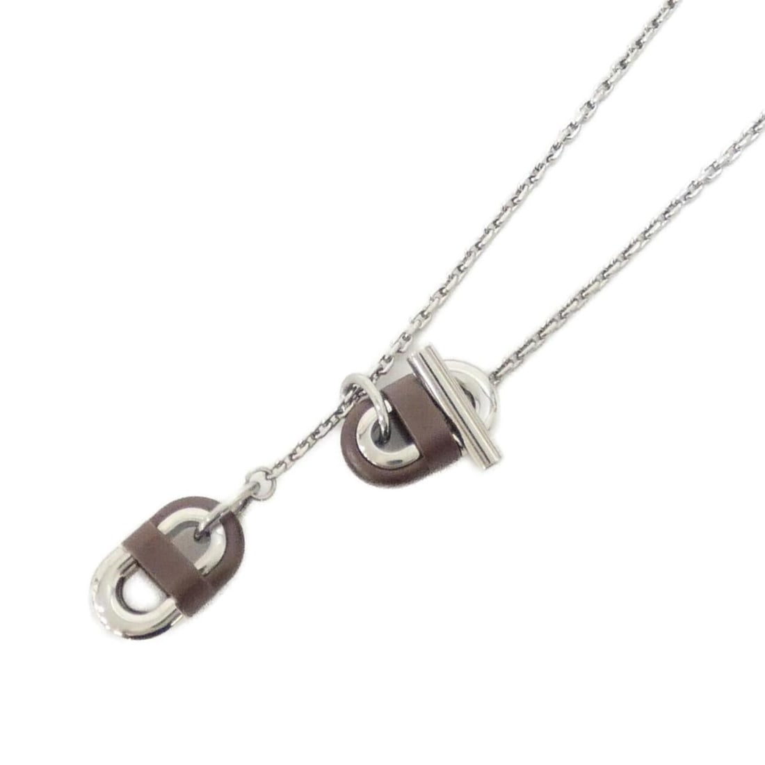 Hermes Hermès Chaine Maillon 100114FJ Necklace: --- Catalog ---Category: SizePendant Size: 25mm x 11mm / 0.98'' x 0.43''Neck Circumference: 60 cm / 23.62''Category: DesignColor: Havane, SilverGender: WomenMaterial: Stainless steelNecklace Type: