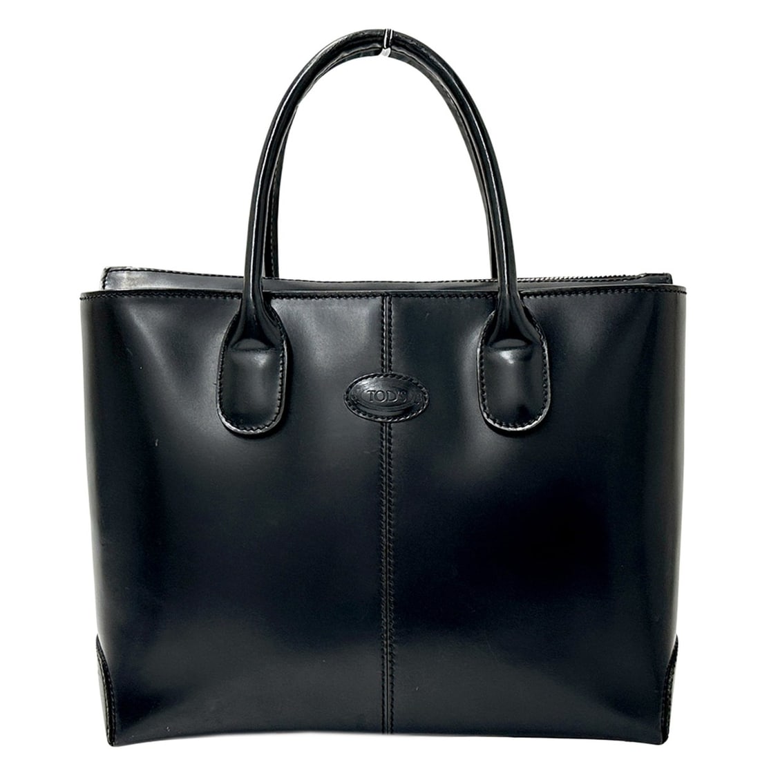 Tod's handbag for women, brand name, tote bag, leather, black.: --- Catalog ---Category: SizeSize (HxWxD): 24cm x 33cm x 10cm / 9.44'' x 12.99'' x 3.93''Category: DesignType: Handbag, Tote bagColor: BlackGender: WomenMaterial: Leather Category: GeneralBrand: Tod's