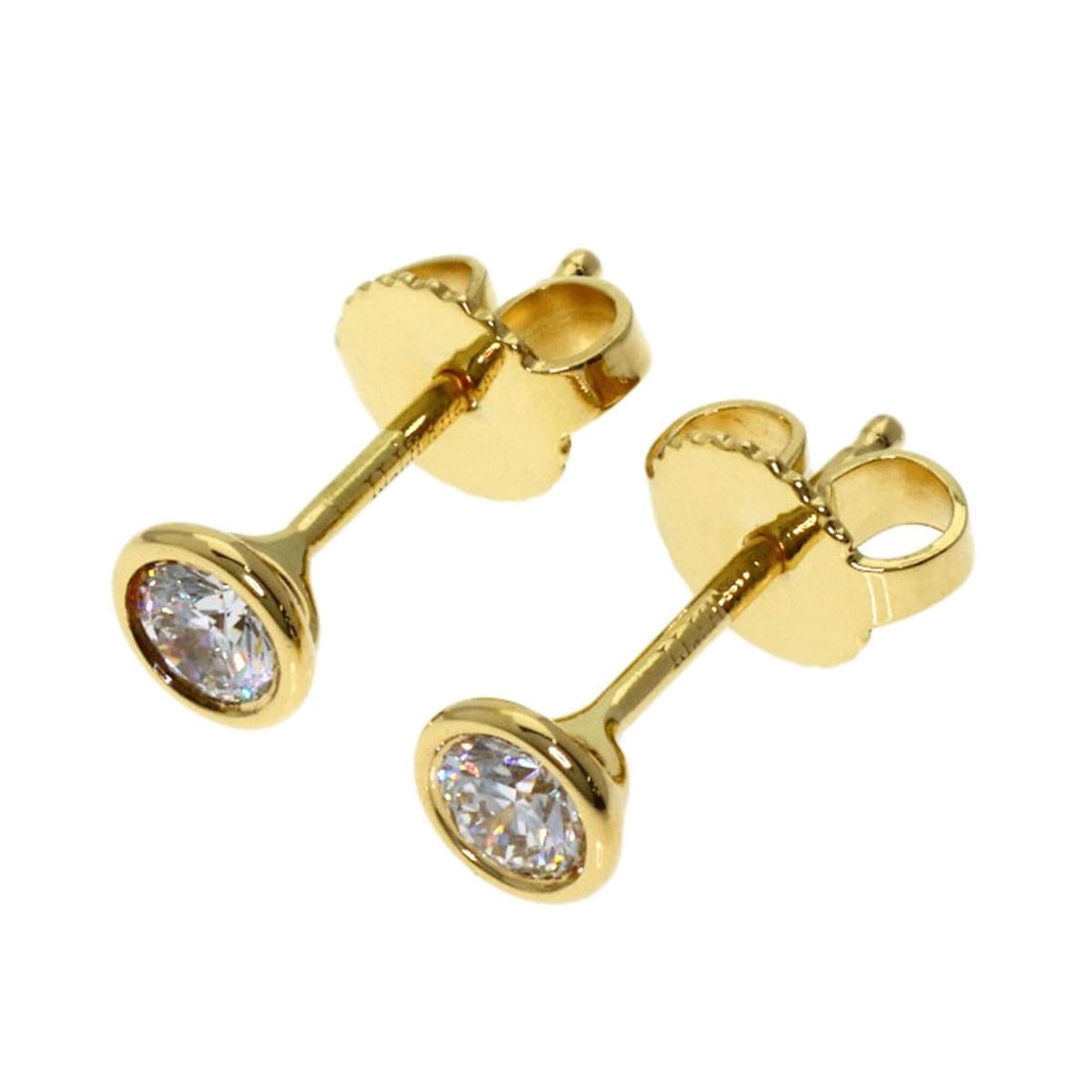 Tiffany & Co. By the Yard Diamond Earrings, 18K Yellow Gold, Women's.: --- Catalog ---Category: SizeWeight: 1g / 0.03oz.Size (HxWxD): 4.80mm x 4.80mm / 0.19'' x 0.19''Category: DesignType: Stud earringsStone: DiamondGender: WomenMaterial: Yellow gold (18K)Category: Gener