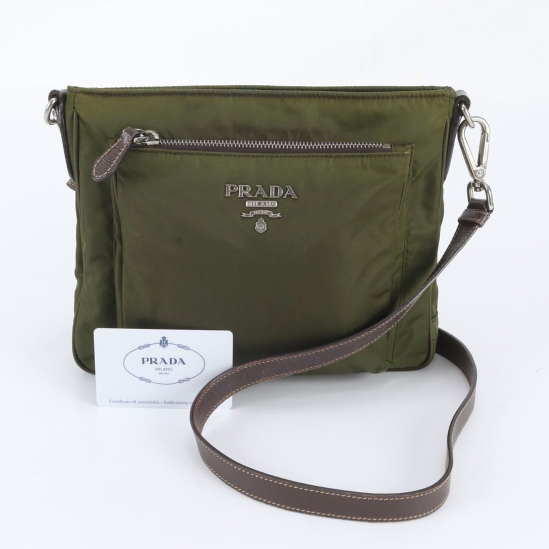 Prada Tessuto Nylon BT0693 Leather Shoulder Bag for Women (with Guarantee Card): --- Catalog ---Category: SizeSize (HxWxD): 19cm x 24cm x 6cm / 7.48'' x 9.44'' x 2.36''Category: DesignType: Shoulder bagColor: Green, KhakiGender: WomenMaterial: Leather , Nylon Category: GeneralMPN: