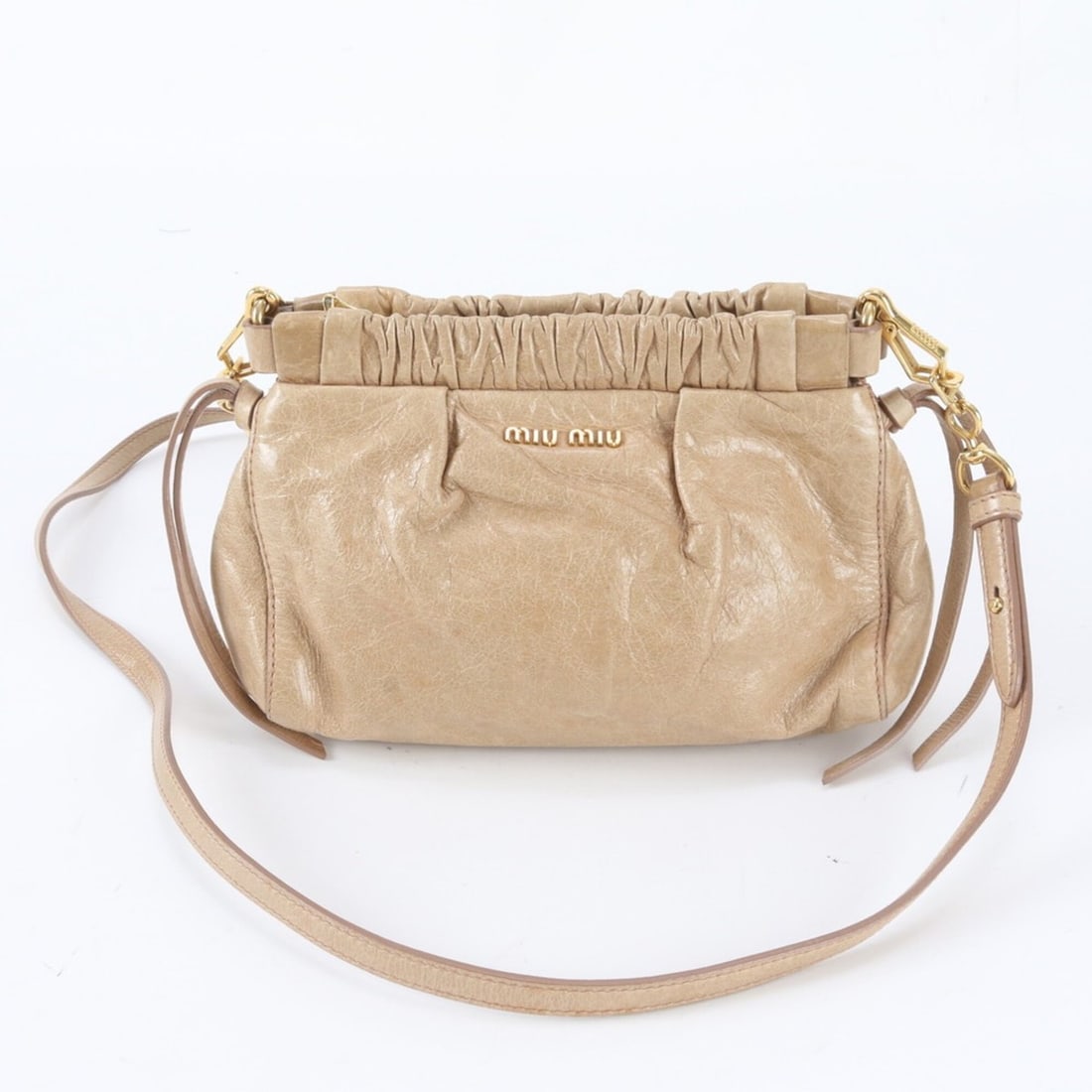Miu Miu Miu Leather Shoulder Bag Crossbody for Women: --- Catalog ---Category: SizeSize (HxWxD): 14cm x 20cm x 7cm / 5.51'' x 7.87'' x 2.75''Category: DesignType: Crossbody bag, Shoulder bagColor: BeigeGender: WomenMaterial: Leather Category: GeneralBran