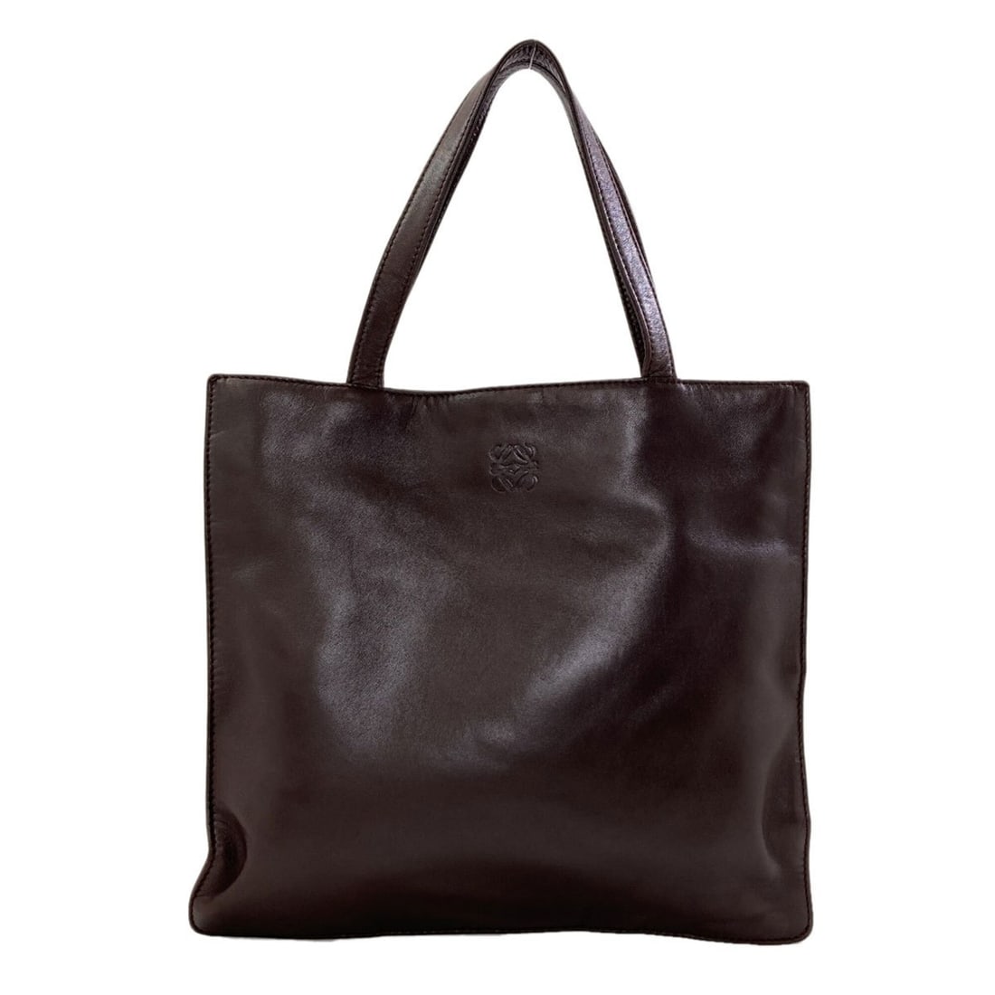 Loewe Square Anagram Handbag, Lambskin, Women's LOEWE: --- Catalog ---Category: SizeSize (HxWxD): 24cm x 26cm x 5.00mm / 9.44'' x 10.23'' x 0.19''Category: DesignType: HandbagColor: Dark brownGender: WomenMaterial: Leather Category: GeneralBrand: Loewe---