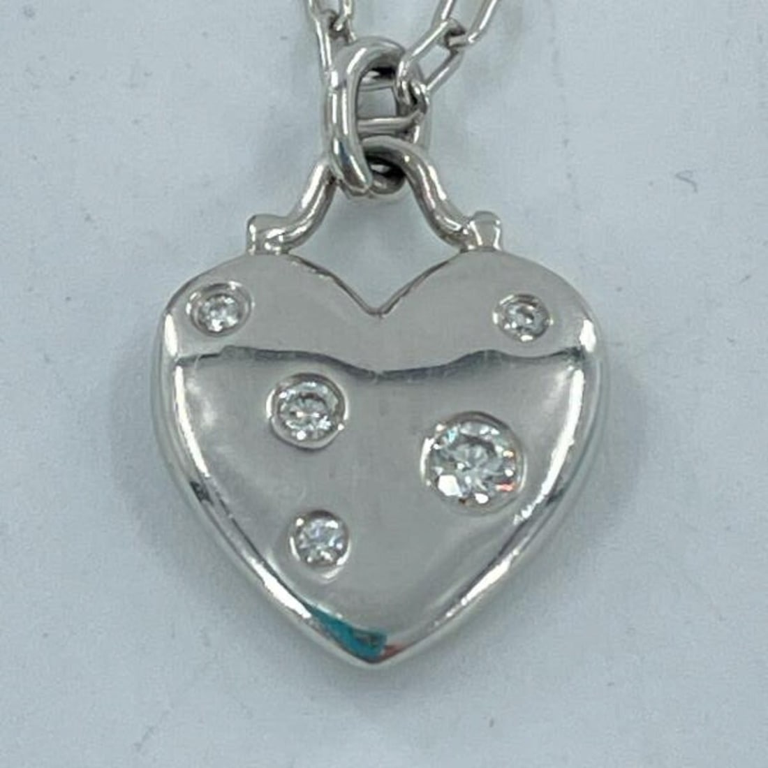 Tiffany & Co. Dots Heart Necklace 750 18K White Gold: --- Catalog ---Category: SizePendant Size: 1.6mm x 1.1mm / 0.06'' x 0.04''Neck Circumference: 41 cm / 16.14''Category: DesignColor: SilverGender: WomenNecklace Type: NecklaceCategory: GeneralBrand: Ti