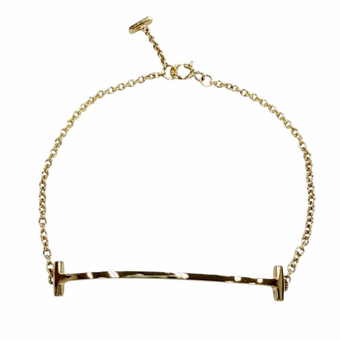 TIFFANY&Co. Tiffany T Smile Bracelet Small AU750 (YG) Yellow Gold Made in Italy Weight 2.1g Women's: --- Catalog ---Category: SizeLength: 15cm / 5.9''Category: DesignType: Charm braceletColor: Yellow goldGender: WomenMaterial: Yellow gold (18K)Category: GeneralBrand: TiffanyCountry of Origin: Italy--