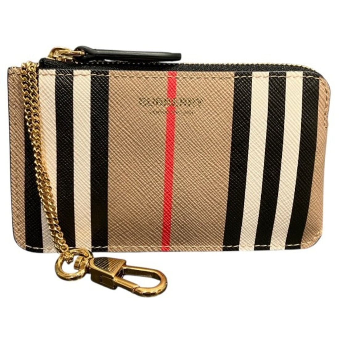 Burberry Icon Stripe PVC Wallet Coin Purse Unisex: --- Catalog ---Category: SizeSize (HxWxD): 7.5cm x 13cm x 1.5cm / 2.95'' x 5.11'' x 0.59''Category: DesignType: Coin purse/coin caseColor: BeigeGender: Women,MenMaterial: PVC , Leather Category: Gener
