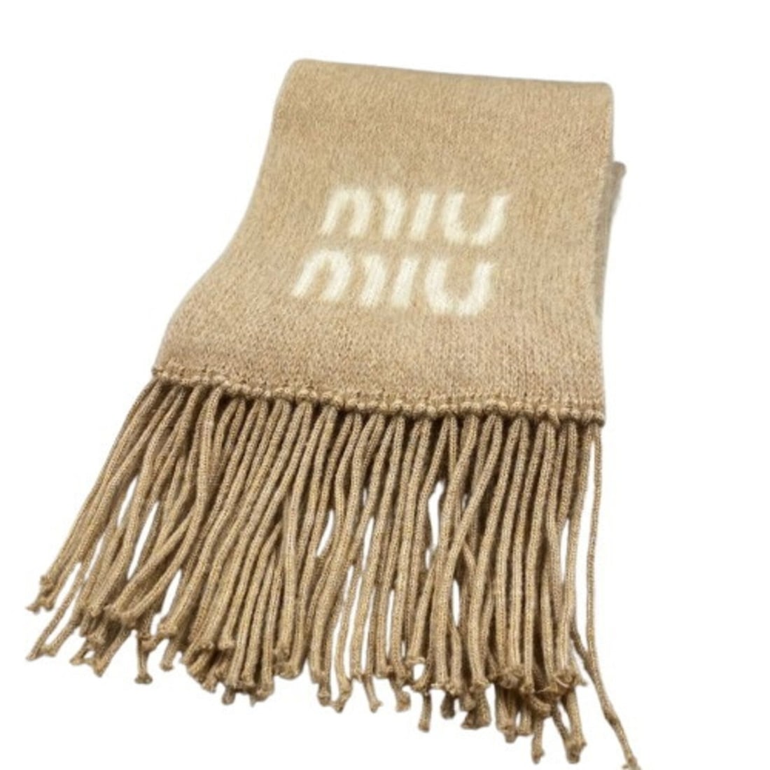 Miu Miu MIU Mohair Beige Scarf: --- Catalog ---Category: SizeSize (LxW): 1.85m x 23cm / 72.83'' x 9.05''Category: DesignType: StoleColor: BeigeGender: WomenMaterial: Nylon 28%, Mohair 67%, Wool 5%Category: GeneralBrand: Miu Miu---