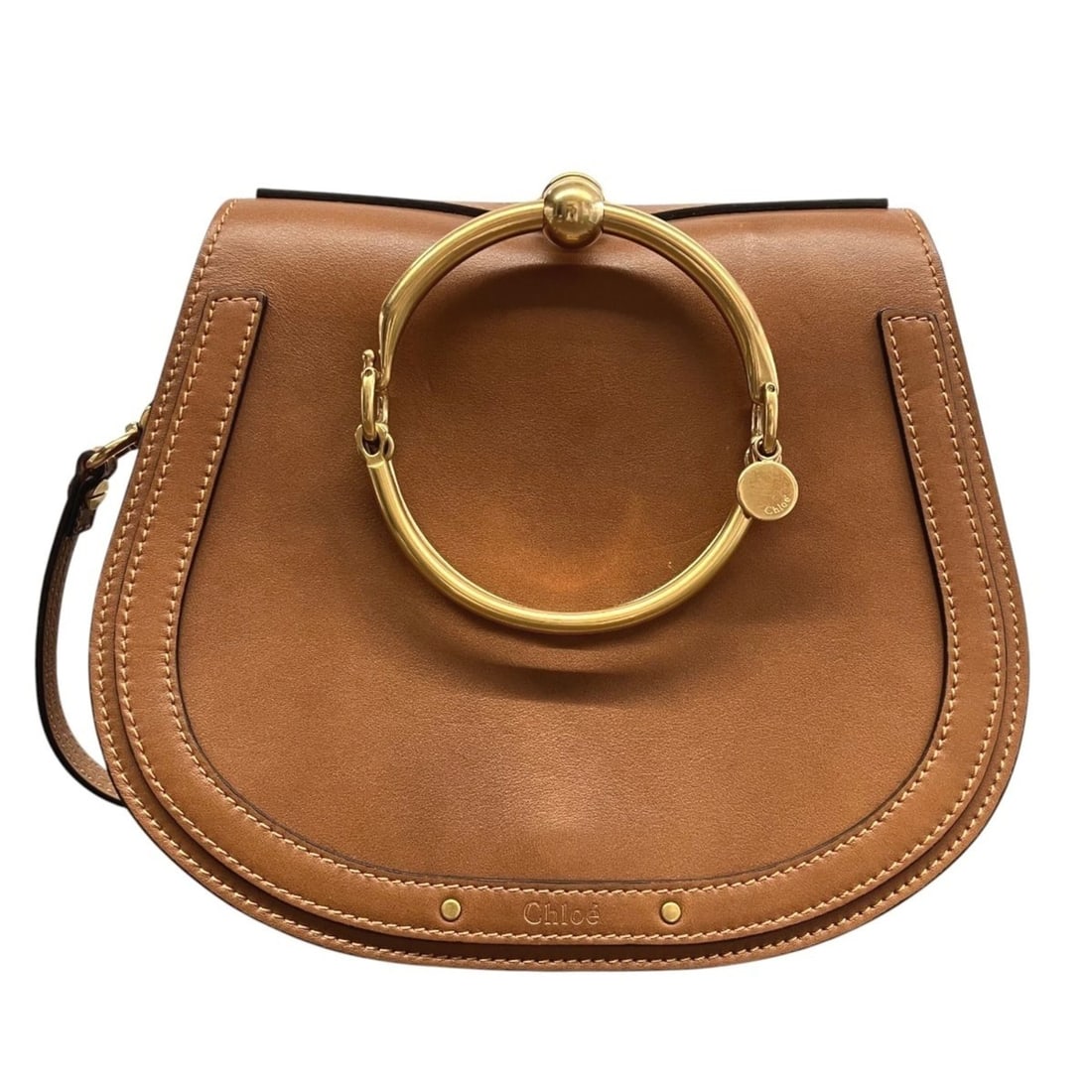 Chloé Chloe Small Bracelet Bag Handbag Nile Leather CHC17US301HEU 211: --- Catalog ---Category: SizeSize (HxWxD): 18cm x 20cm x 8cm / 7.08'' x 7.87'' x 3.14''Strap Length: 107cm - 122cm / 42.12'' - 48.03''Category: DesignType: HandbagColor: BrownGender: WomenClosure: Sna
