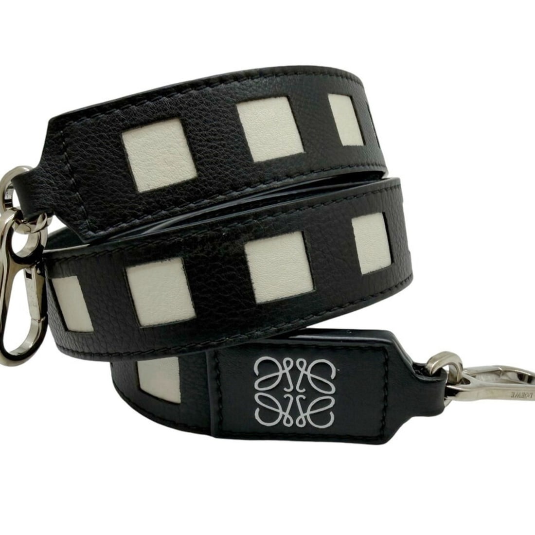 LOEWE bag strap, Anagram design, calfskin, black and white leather, for women men.: --- Catalog ---Category: SizeHandle/Strap Length: 87cm / 34.25''Category: DesignType: StrapColor: Black, WhiteGender: Men,WomenMaterial: LeatherCategory: GeneralBrand: LoeweModel: anagramCountry of Or