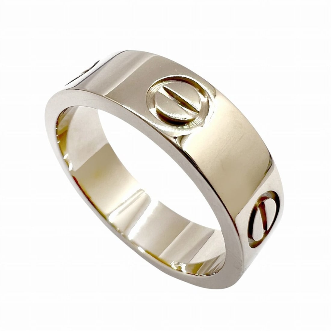 Cartier Love Ring K18WG #52 LOVE RING Au750 for Men and Women: --- Catalog ---Category: SizeUS Size: 6.5Brand Size: 52Category: DesignType: Band ringColor: White goldStone: No StoneGender: Men,WomenMaterial: White gold (18K)Category: GeneralLine: LoveBrand: Carti