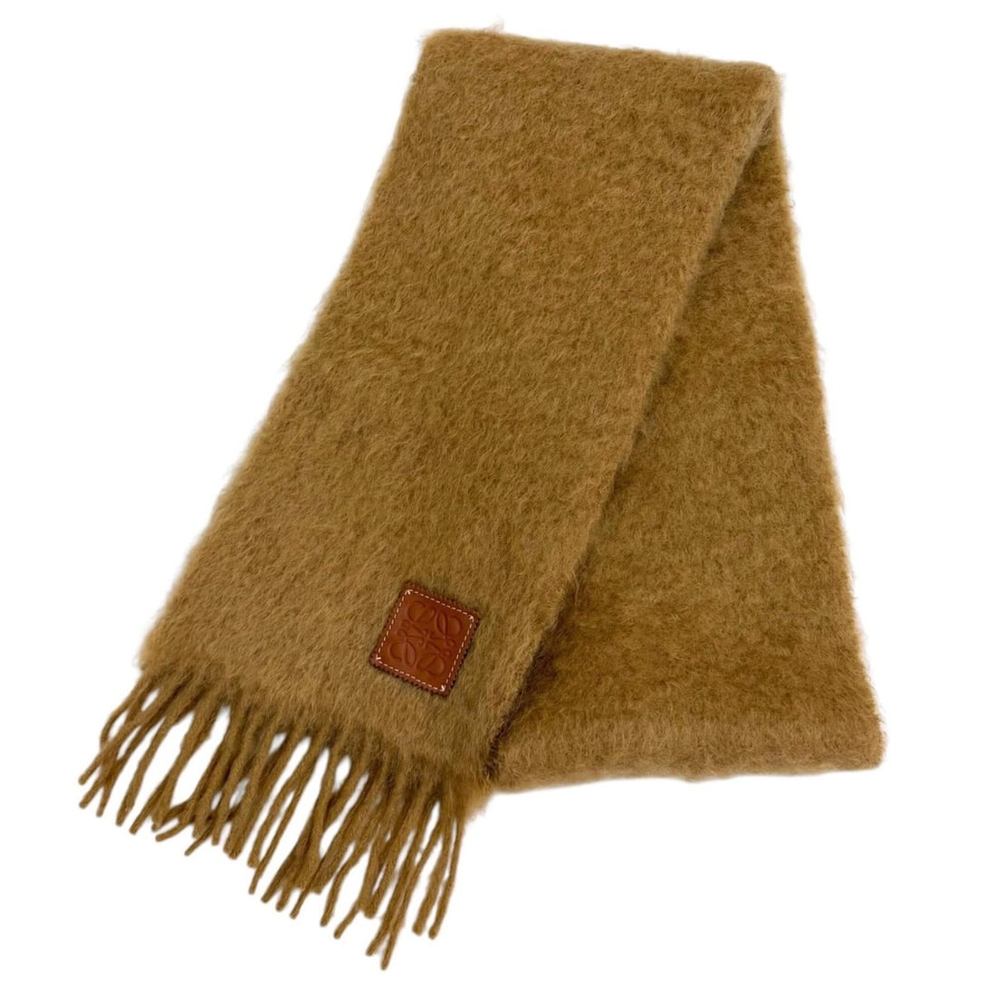 LOEWE A-28003861 Mohair and Wool Blend Stole/Scarf with Leather Anagram Patch Fringe, Brown, Made in: --- Catalog ---Category: SizeSize (LxW): 1.86m x 22cm / 73.22'' x 8.66''Category: DesignType: StoleColor: BrownGender: WomenMaterial: Mohair , Wool , Nylon Category: GeneralMPN: A-28003861Brand: Loewe