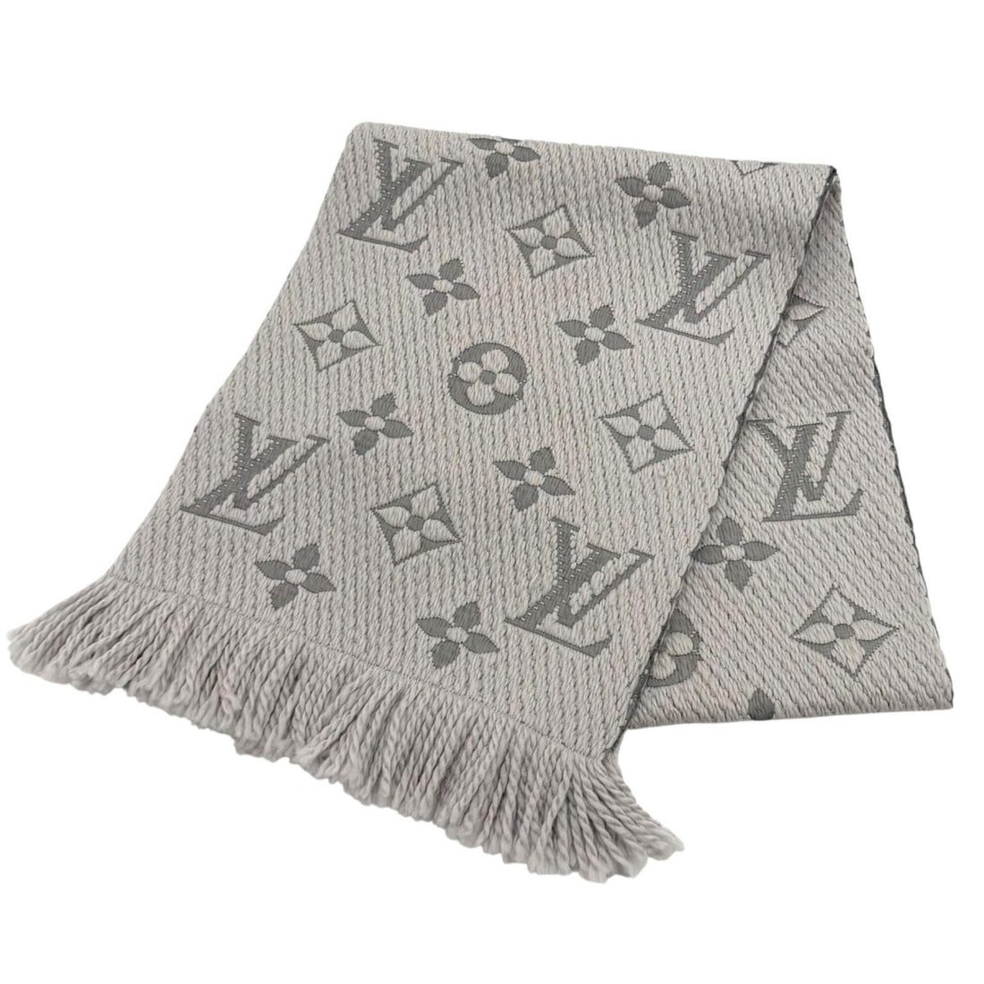 LOUIS VUITTON M74742 Echarpe Logo Mania Wool Silk Blend Gris Perle Fringe Stole Scarf Made in Italy: --- Catalog ---Category: SizeSize (LxW): 1.57m x 30.5cm / 61.81'' x 12''Category: DesignType: StoleGender: WomenMaterial: Wool , Silk Category: GeneralMPN: M74742Brand: Louis VuittonCountry of Origin: