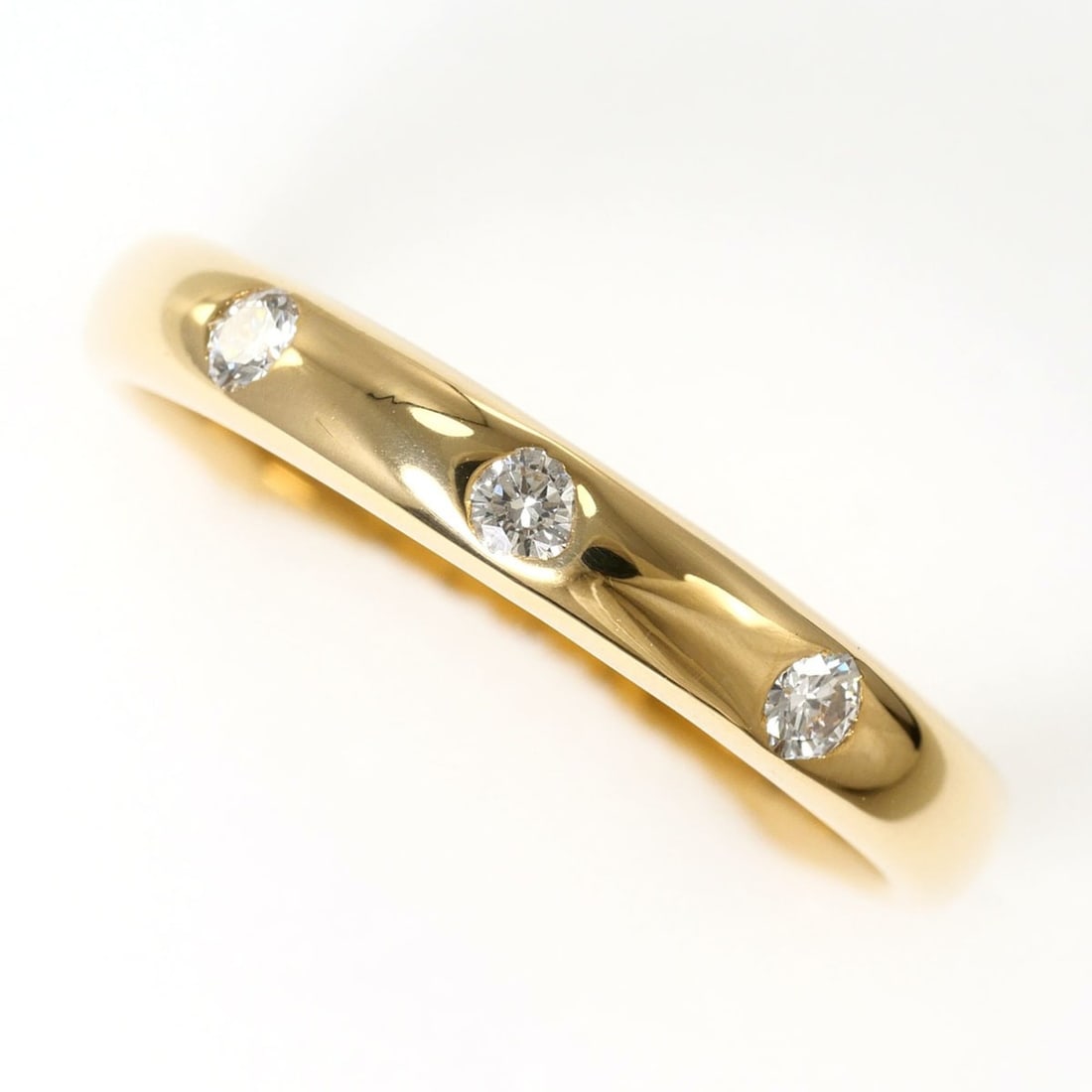 18K (18-karat) Yellow Gold Ring with 0.10ct Diamond, Certificate of Authenticity, Total Weight 2.9g,: --- Catalog ---Category: SizeWidth: 3mm / 0.12''Weight: 2.9g / 0.1oz.JP Size: 11US Size: 6Category: DesignType: Band ringColor: Yellow goldMetal: GoldStone: DiamondGender: WomenMaterial: Yellow gold (