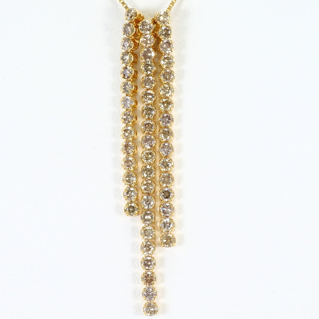 18K (18-karat) Yellow Gold Necklace with Brown Diamonds (0.35ct and 0.40ct), Certificate of: --- Catalog ---Category: SizeWeight: 2.8g / 0.09oz.Pendant Size: 40mm x 6mm / 1.57'' x 0.23''Neck Circumference: 45 cm / 17.71''Category: DesignColor: Brown, Yellow goldMetal: GoldStone: DiamondGender