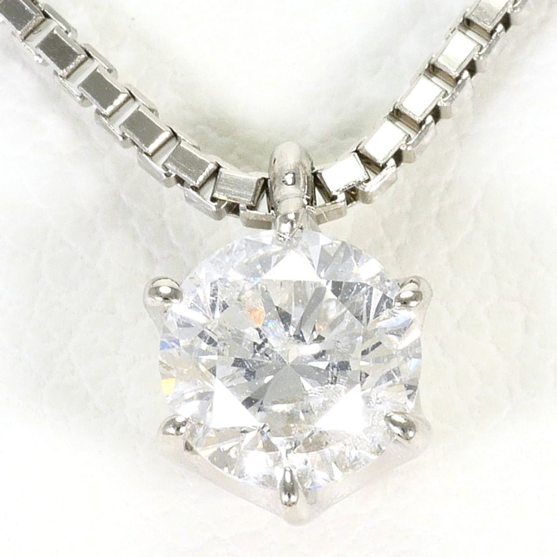 PT900 Platinum / PT850 Necklace with 0.58ct Diamond (I1 clarity), Certificate of Authenticity, Total: --- Catalog ---Category: SizeWeight: 4.6g / 0.16oz.Pendant Size: 7mm x 6mm / 0.27'' x 0.23''Neck Circumference: 39 cm / 15.35''Category: DesignColor: PlatinumMetal: PlatinumStone: DiamondGender: Women