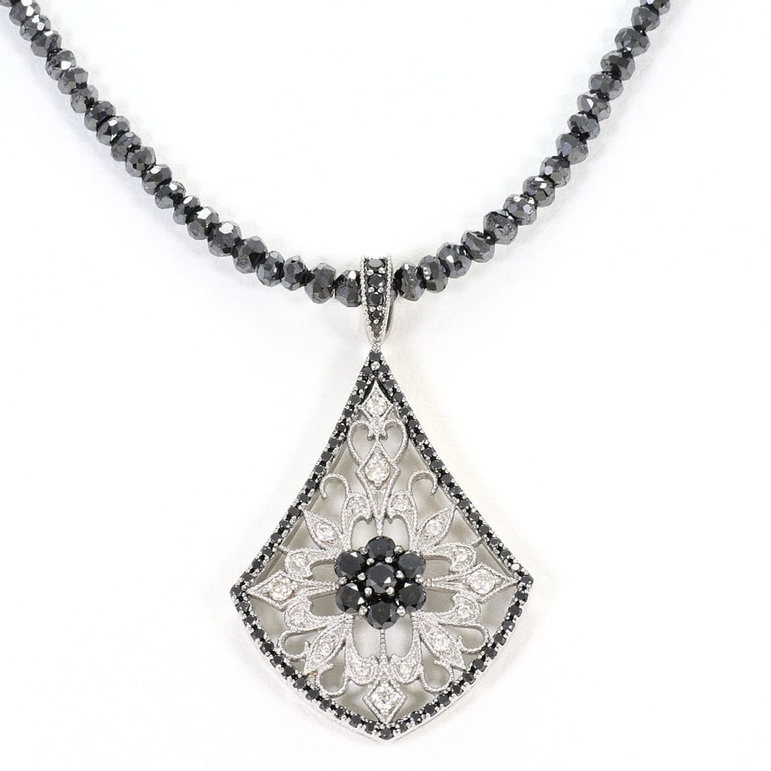 18K (18-karat white gold) necklace with black diamonds (1.00ct and 20.00ct), includes appraisal: --- Catalog ---Category: SizeWeight: 11.3g / 0.39oz.Pendant Size: 42mm x 24mm / 1.65'' x 0.94''Neck Circumference: 45 cm / 17.71''Category: DesignColor: White goldMetal: White GoldStone: DiamondGender