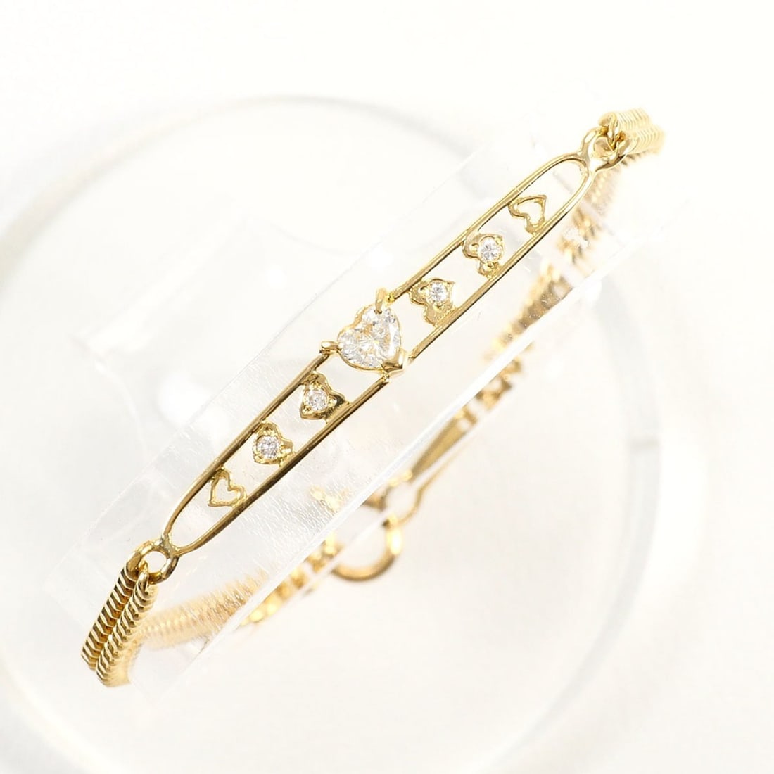 18K (18-karat) Yellow Gold Bracelet with 0.20ct Diamond, Certificate of Authenticity, Total Weight: --- Catalog ---Category: SizeLength: 18cm / 7.08''Weight: 4.7g / 0.16oz.Category: DesignType: Charm braceletColor: Yellow goldMetal: GoldStone: DiamondGender: WomenMaterial: Yellow gold (18K)Metal Pur