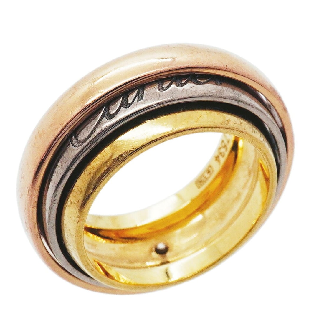Cartier Trinity Must Essence Ring, available in 18K Yellow Gold, White and Pink size #49 (Women's).: --- Catalog ---Category: SizeUS Size: 5Brand Size: 49Category: DesignType: Band ringGender: WomenMaterial: Pink gold (18K), White gold (18K), Yellow gold (18K)Category: GeneralBrand: Cartier--- Item L