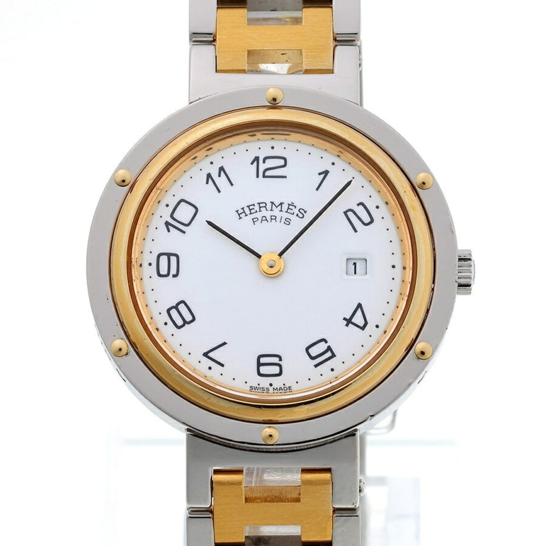 Hermes Clipper watch, white, quartz, 30 mm: --- Catalog ---Category: SizeWrist Size: 15.5cm / 6.1''Case Diameter: 30mm / 1.18''Category: DesignType: WristwatchGender: WomenColor (Dial): WhiteMaterial (Band): Gold plated, Stainless steelMaterial