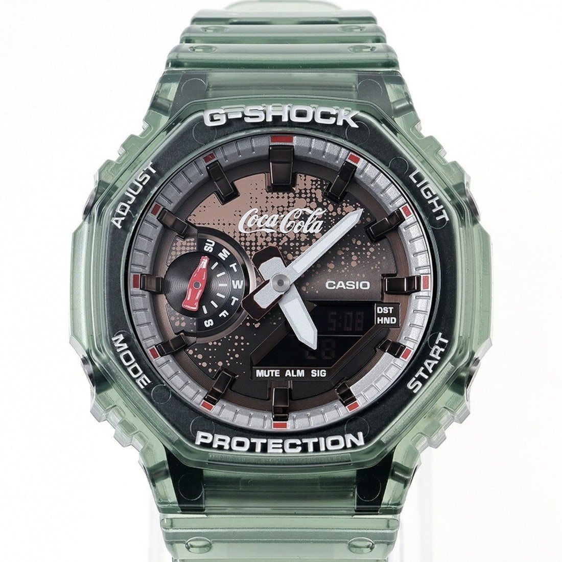 Casio G-SHOCK 2100 Series Coca-Cola Collaboration Model GA-2100CC-3AJR Watch, Quartz, Analog-Digital: --- Catalog ---Category: SizeWrist Size: 14.5cm - 21.5cm / 5.7'' - 8.46''Case Diameter: 45.4mm / 1.79''Category: DesignType: WristwatchGender: MenColor (Dial): BrownMaterial (Case): Carbon fiberCatego