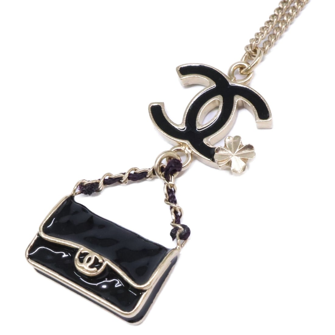CHANEL B12A Matelassé Bag with Clover & Coco Mark Motif Long Chain Necklace, Black Gold Hardware,: --- Catalog ---Category: SizePendant Size: 40mm x 18mm / 1.57'' x 0.7''Neck Circumference: 60 cm / 23.62''Category: DesignColor: BlackGender: WomenMaterial: Gold platingNecklace Type: NecklaceCategory