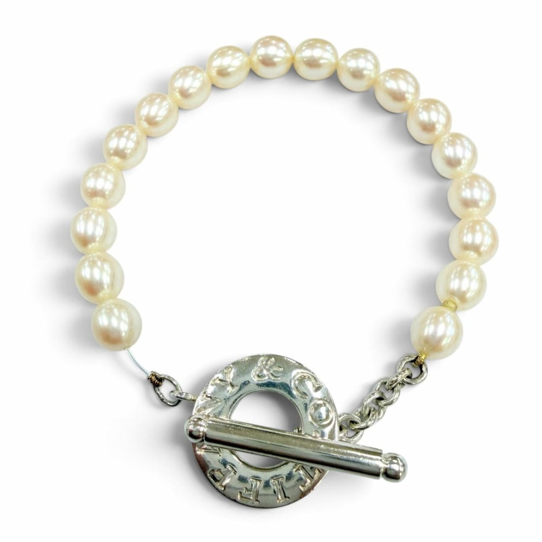 TIFFANY&Co. Tiffany Freshwater Pearl 925 Toggle Bracelet, Silver, Total Weight 21.2g, Women's.: --- Catalog ---Category: SizeLength: 17.5cm / 6.88''Category: DesignType: Charm braceletColor: SilverStone: Freshwater pearlGender: WomenMaterial: Silver 925Category: GeneralBrand: Tiffany--- Item Lis