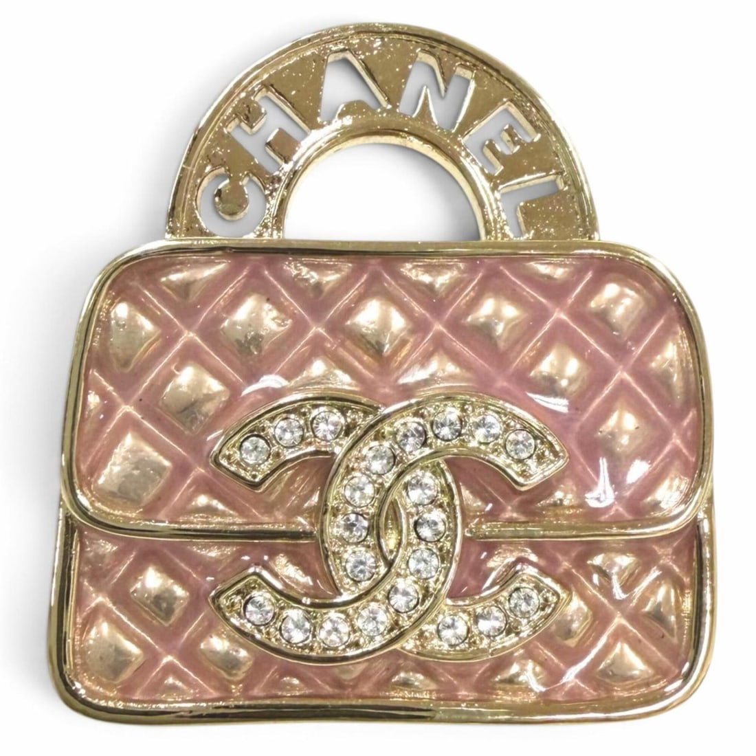 CHANEL Rhinestone Matelassé Bag Motif Brooch with Coco Mark Logo (B24S) - Gold & Pink Made in Italy: --- Catalog ---Category: SizeSize (HxWxD): 2.4cm x 2.1cm / 0.94'' x 0.82''Category: DesignType: BroochColor: Gold, PinkGender: WomenMaterial: RhinestoneCategory: GeneralBrand: ChanelCountry of Origin: