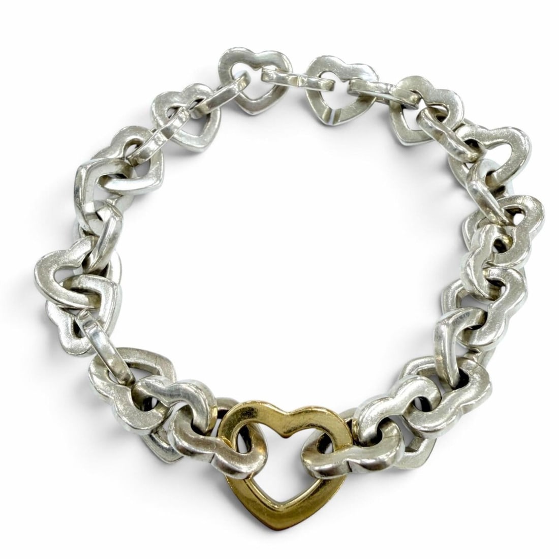 TIFFANY&Co. Tiffany Vintage Heart Link Bracelet 925 750 (YG) Silver Yellow Gold Weight 35.5g Women's: --- Catalog ---Category: SizeLength: 16cm / 6.29''Category: DesignType: Charm braceletColor: Silver, Yellow goldGender: WomenMaterial: Silver 925, Yellow gold (18K)Category: GeneralBrand: Tiffany--- I