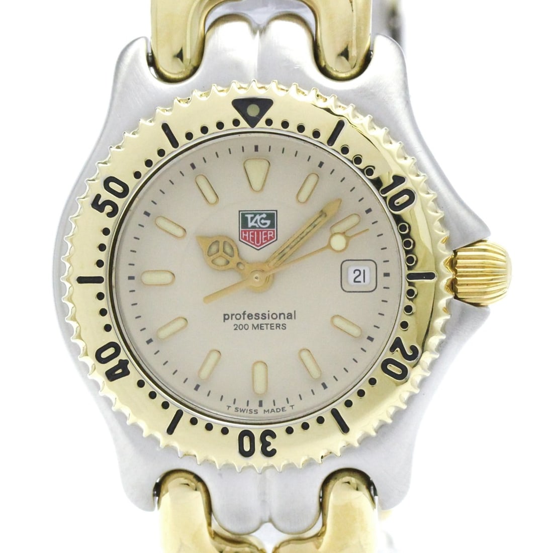 TAG HEUER Sel Professional 200M Gold Plated Steel Watch WG1321 Polished: --- Catalog ---Category: SizeCase Diameter: 27mm / 1.06''Category: DesignType: WristwatchStyle: Dress/FormalGender: WomenColor (Dial): IvoryMaterial (Band): Gold plated, Stainless steelMaterial (Case)