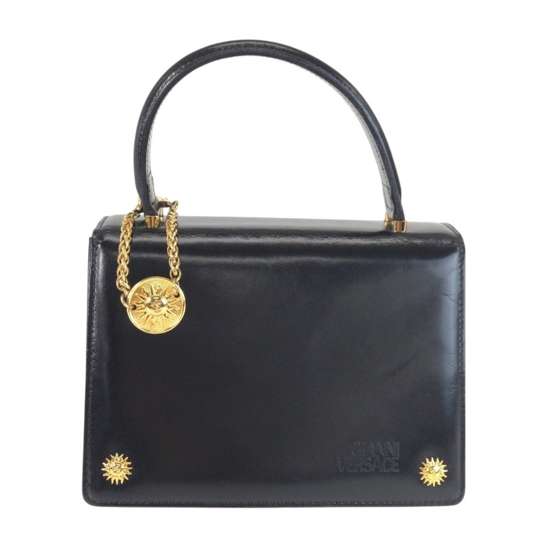 VERSACE Sunburst Black Leather Handbag with Gold Hardware for Women: --- Catalog ---Category: SizeSize (HxWxD): 15cm x 21cm x 11cm / 5.9'' x 8.26'' x 4.33''Category: DesignType: HandbagColor: BlackGender: WomenMaterial: Leather Hardware Color: GoldCategory: GeneralBran