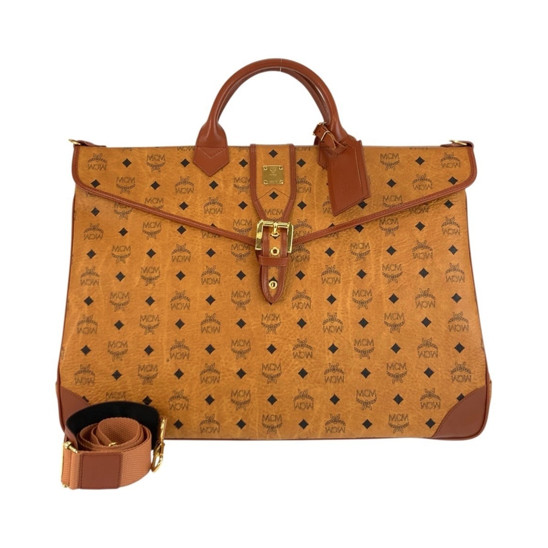 MCM Vintage Visetos Brown Cognac Leather Boston Bag/Shoulder Bag (2-Way) for Men: --- Catalog ---Category: SizeSize (HxWxD): 38cm x 50cm x 20cm / 14.96'' x 19.68'' x 7.87''Category: DesignType: Boston bag, Shoulder bagColor: BrownGender: MenMaterial: Leather Hardware Color: GoldCat
