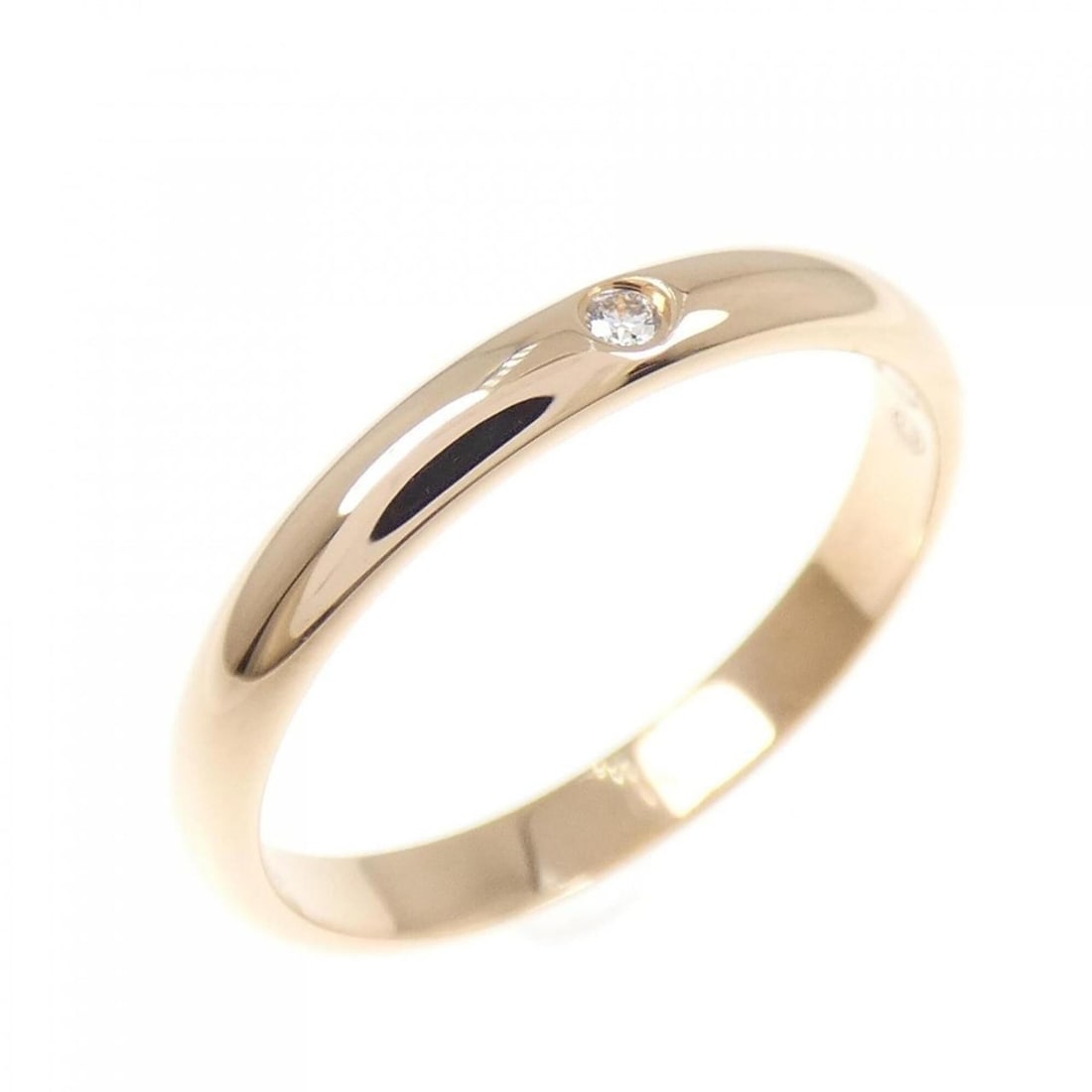 Cartier wedding ring: --- Catalog ---Category: SizeUS Size: 5.5Brand Size: 50Category: DesignType: Band ringGender: WomenMaterial: Pink gold (18K)Category: GeneralMPN: B4088200Brand: Cartier--- Item List ---Section: