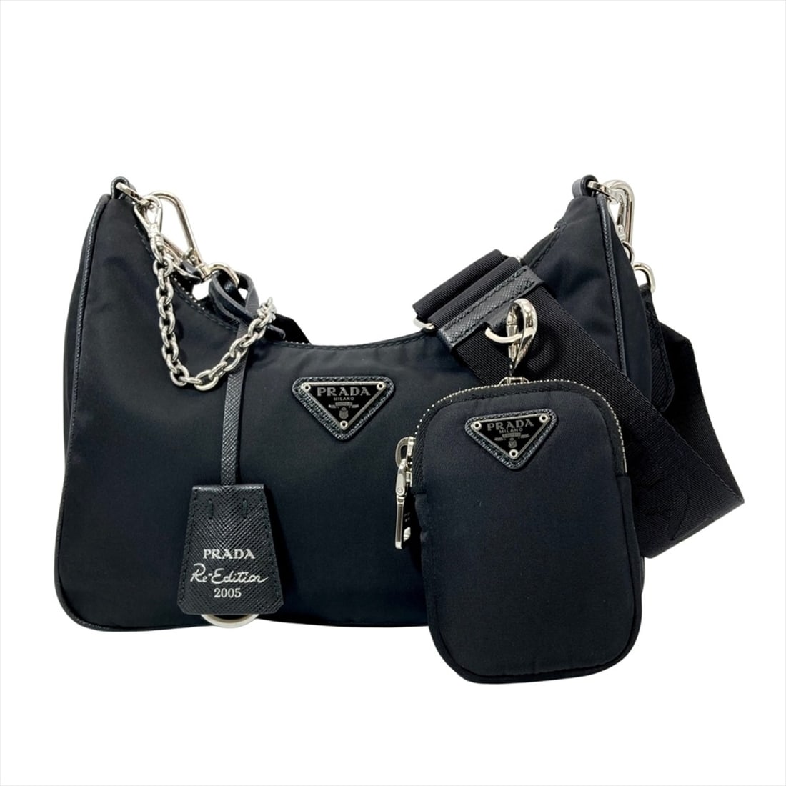 Prada Re-Edition 2005 Nylon Shoulder Bag, 3-Way, 1BH204, Black with Silver Hardware, Handbag, Pouch,: --- Catalog ---Category: SizeStrap Drop: 29cm / 11.41''Size (HxWxD): 16.5cm x 22cm x 5.5cm / 6.49'' x 8.66'' x 2.16''Strap Length: 93cm / 36.61''Category: DesignType: Handbag, Shoulder bagColor: Black