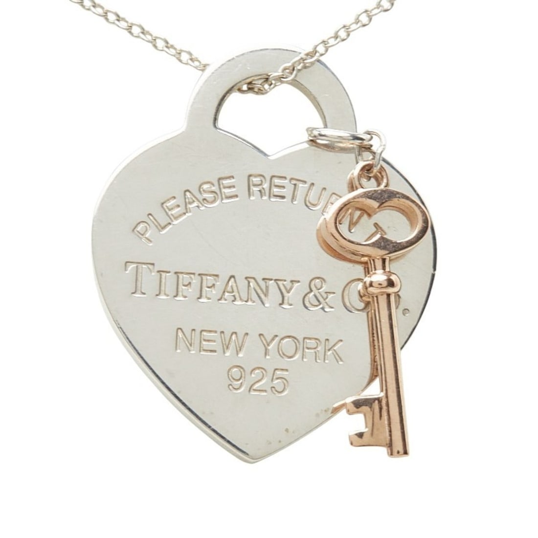 Tiffany & Co. Return to Heart Key Pendant Necklace, Sterling Silver (SV925), Women's.: --- Catalog ---Category: SizePendant Size: 20.8mm x 25.3mm / 0.81'' x 0.99''Neck Circumference: 40.5 cm / 15.94''Category: DesignColor: SilverGender: WomenMaterial: Silver 925Necklace Type: Pendant ne