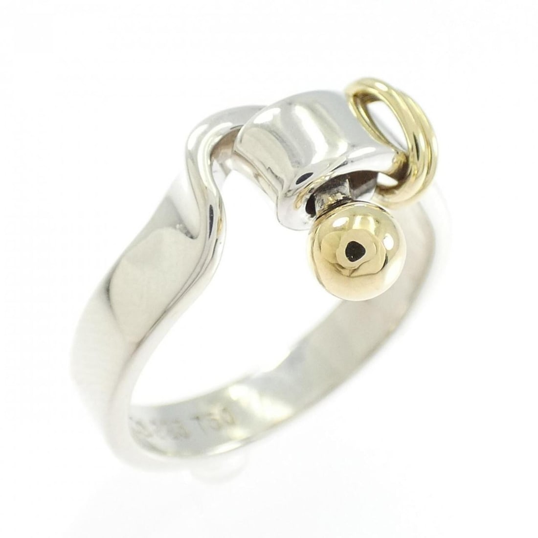 Tiffany Love Knot Ring: --- Catalog ---Category: SizeJP Size: 12.5US Size: 6.5Category: DesignType: Band ringGender: WomenMaterial: Silver 925, Yellow gold (18K)Category: GeneralBrand: Tiffany--- Item List ---Section: Condit