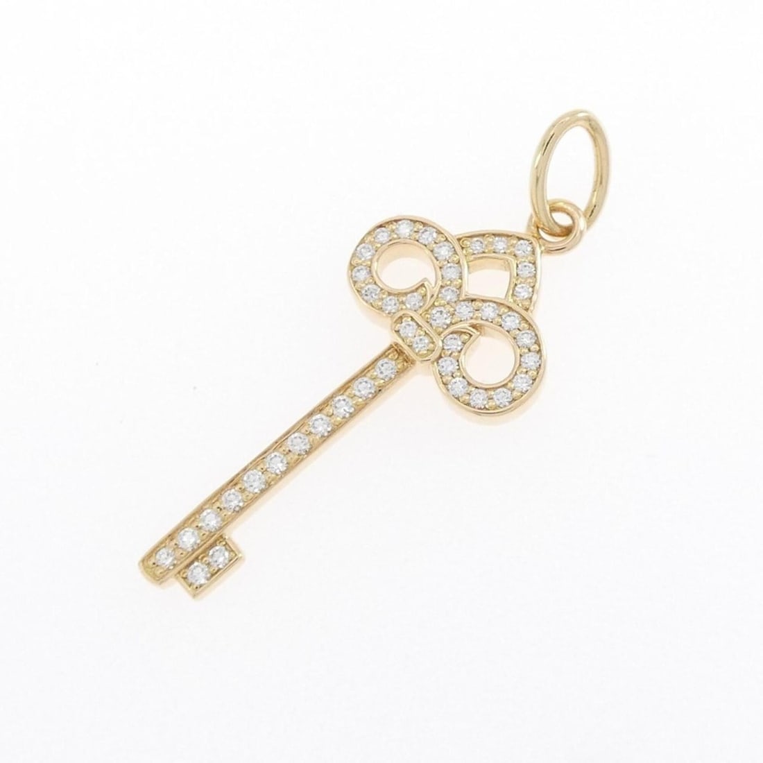 Tiffany & Co. Fleur-de-lis Key Pendant: --- Catalog ---Category: SizeNeck Circumference: 29.3 cm - 10.5 cm / 11.53'' - 4.13''Category: DesignStone: DiamondGender: WomenMaterial: Yellow gold (18K)Necklace Type: PendantCategory: