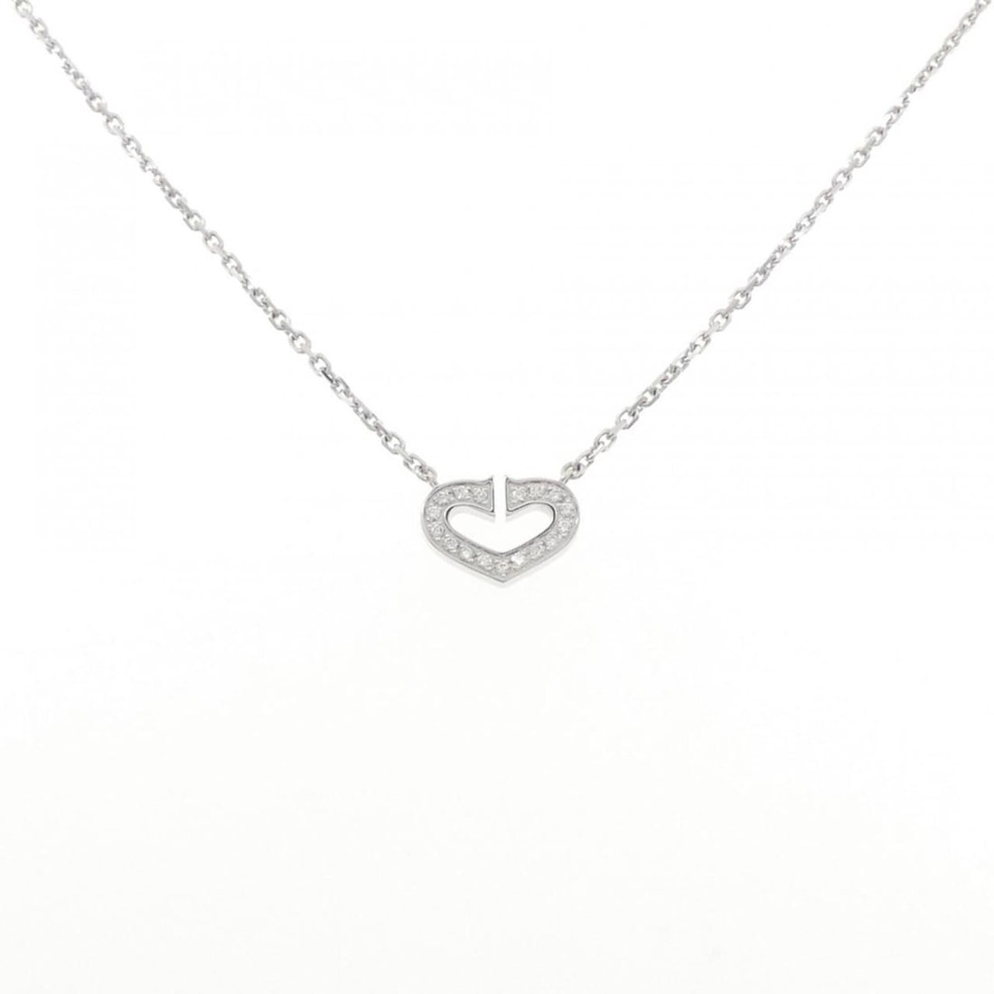 Cartier C Heart Necklace: --- Catalog ---Category: SizePendant Size: 9.6mm x 12.3mm / 0.37'' x 0.48''Neck Circumference: 40 cm / 15.74''Category: DesignColor: White goldStone: DiamondGender: WomenMaterial: White gold