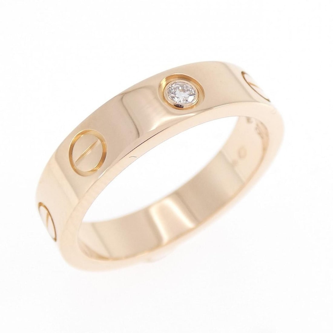 Cartier Mini Love 1P Ring: --- Catalog ---Category: SizeUS Size: 4.5Brand Size: 48Category: DesignType: Band ringColor: Pink goldStone: DiamondGender: WomenMaterial: Pink gold (18K)Category: GeneralMPN: B4050700Brand: