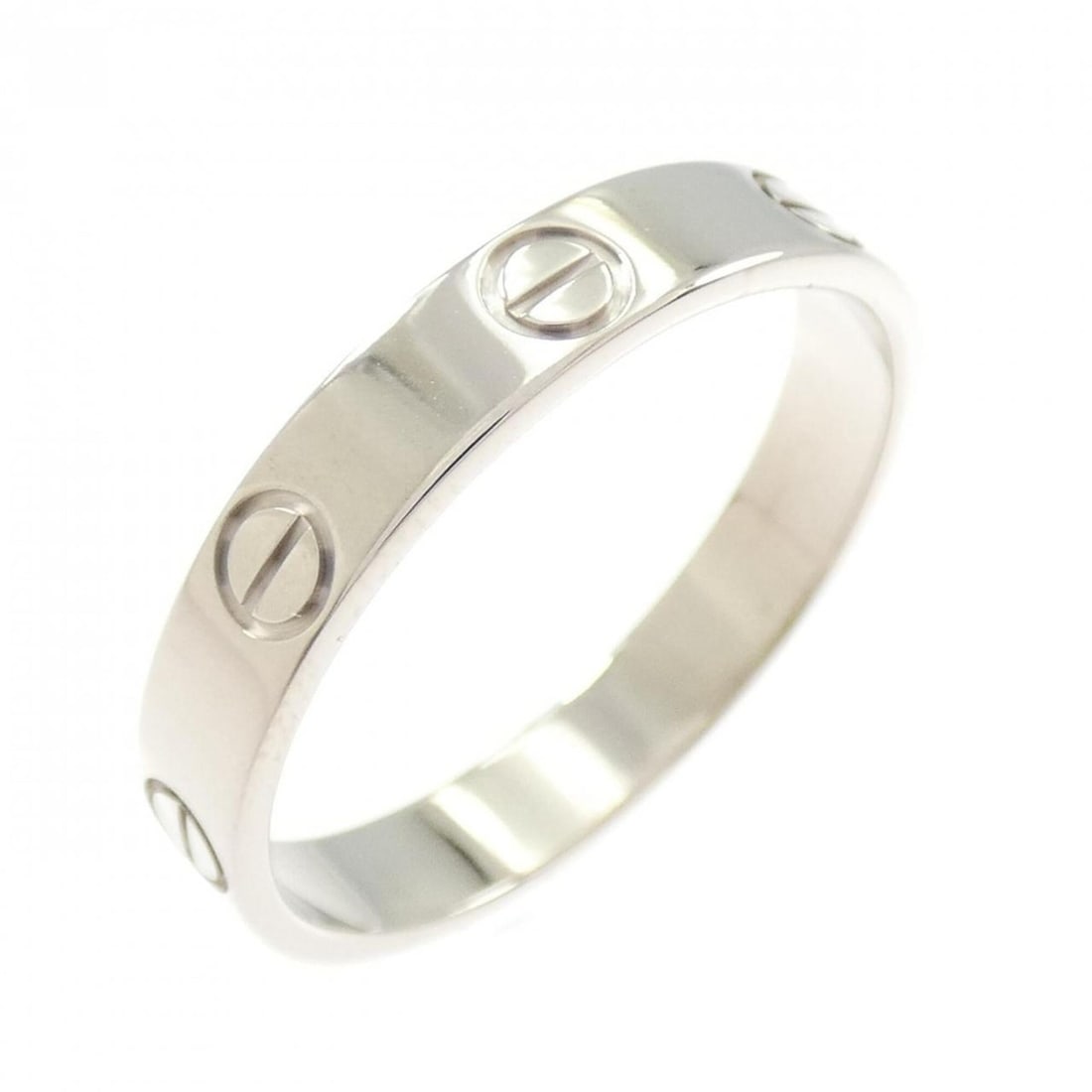 Cartier Mini Love Ring: --- Catalog ---Category: SizeUS Size: 8.5Brand Size: 57Category: DesignType: Band ringColor: White goldGender: Women,MenMaterial: White gold (18K)Category: GeneralMPN: B4085100Brand: Cartier--- Item L