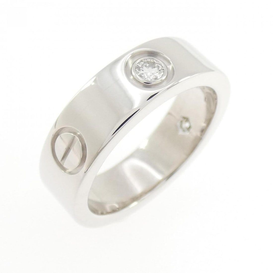 Cartier Love Half-Diamond Ring: --- Catalog ---Category: SizeUS Size: 6Brand Size: 51Category: DesignType: Band ringColor: White goldStone: DiamondGender: WomenMaterial: White gold (18K)Category: GeneralMPN: B4032500Brand: