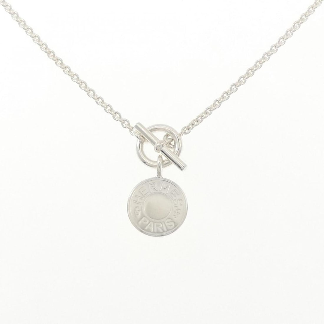 Hermes Amulette H Confetti Necklace: --- Catalog ---Category: SizePendant Size: 27.1mm x 13.9mm / 1.06'' x 0.54''Neck Circumference: 41 cm / 16.14''Category: DesignColor: SilverGender: WomenMaterial: Silver 925Necklace Type: