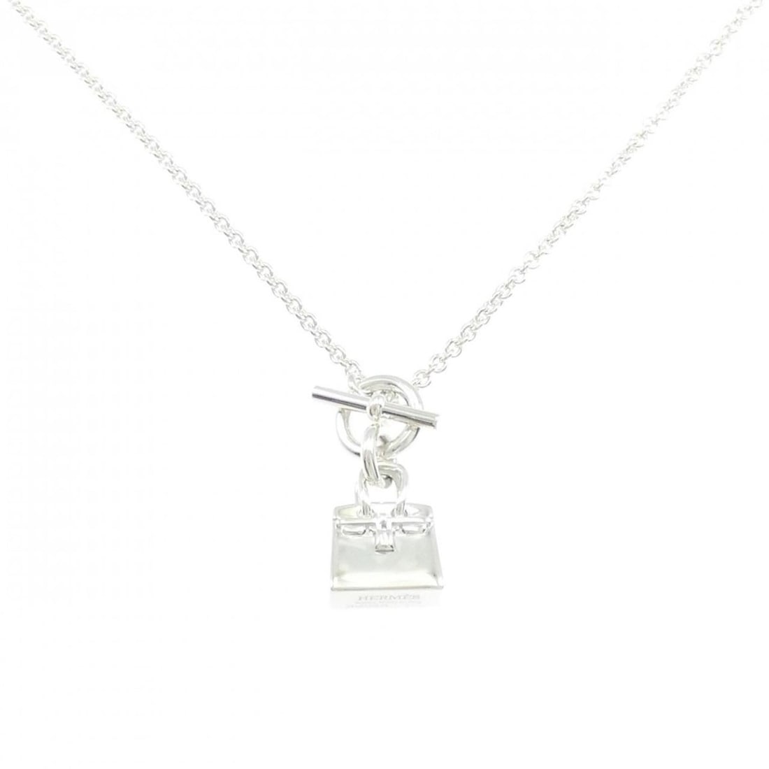 Hermes Amulette Birkin Necklace: --- Catalog ---Category: SizePendant Size: 28.3mm x 12.6mm / 1.11'' x 0.49''Neck Circumference: 40 cm / 15.74''Category: DesignColor: SilverGender: WomenMaterial: Silver 925Necklace Type: