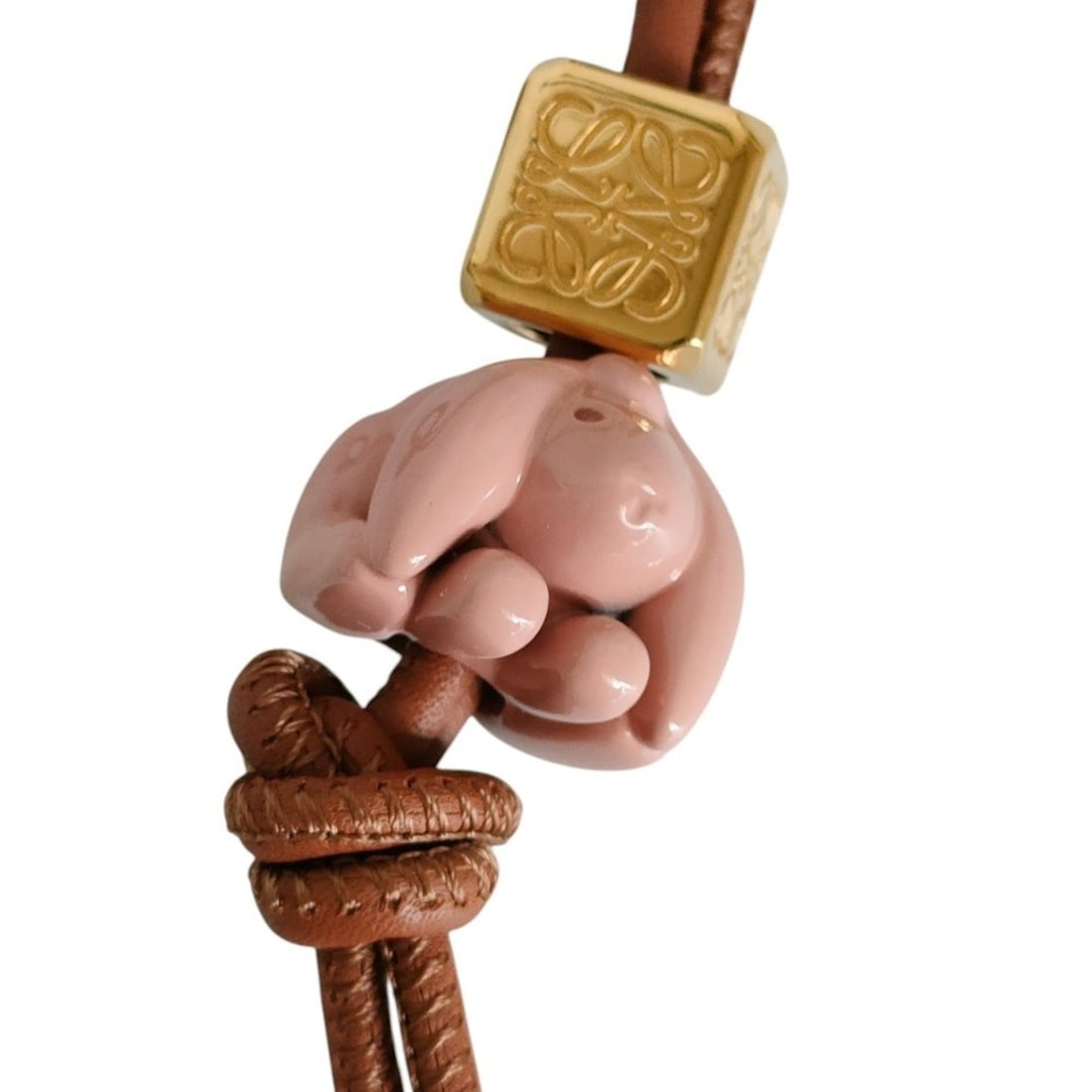LOEWE Leather Animal Charm Strap with Anagram Dice, Brown, Women's: --- Catalog ---Category: SizeSize (HxWxD): 315.00mm x 18.00mm / 12.40'' x 0.71''Category: DesignType: Keyring charmColor: BrownGender: WomenMaterial: LeatherCategory: GeneralBrand: Loewe--- Item List 