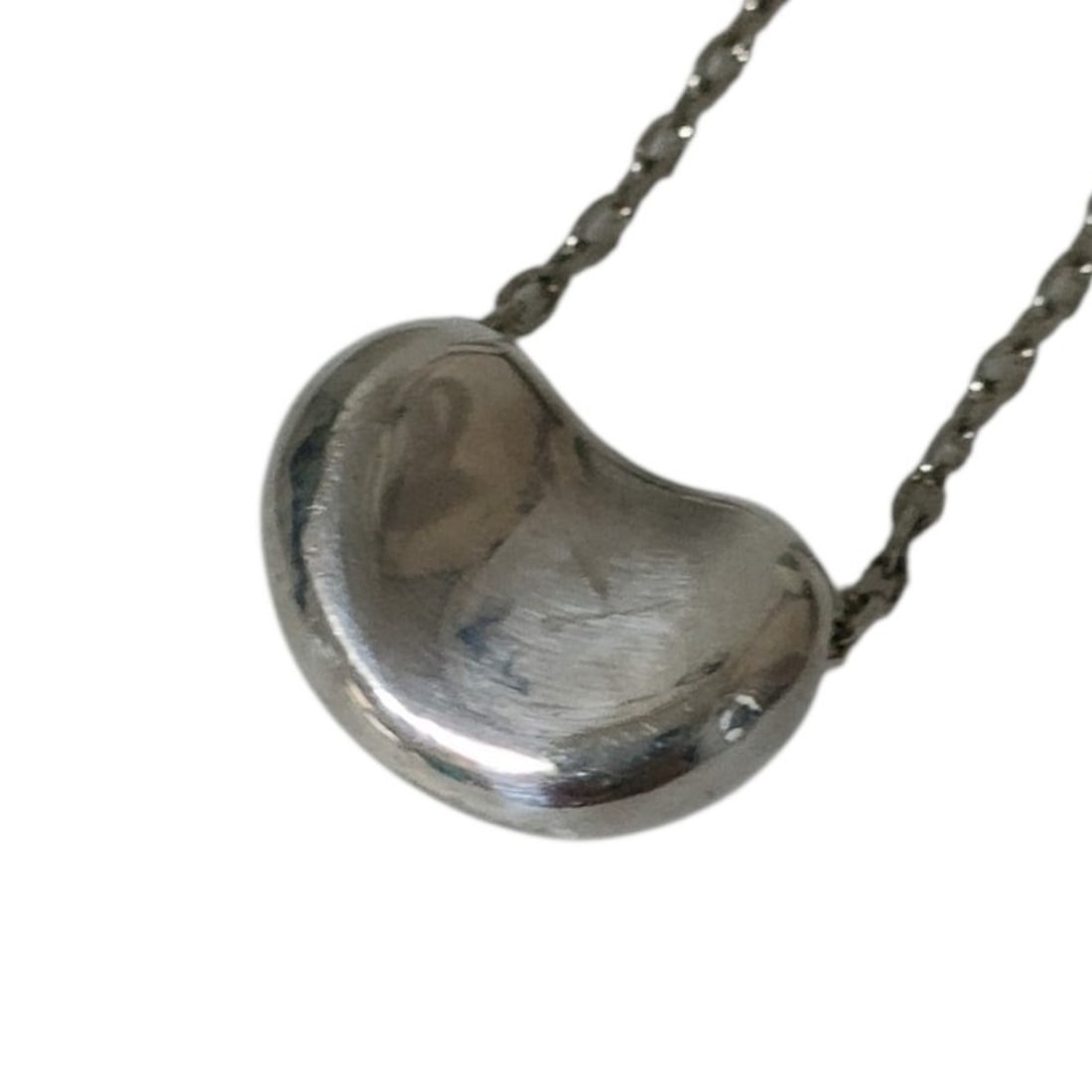 TIFFANY&Co. Tiffany & Co. Elsa Peretti Beans Chain Pendant Necklace, 925 Sterling Silver, Women's: --- Catalog ---Category: SizePendant Size: 0.8mm x 1.1mm / 0.03'' x 0.04''Neck Circumference: 41 cm / 16.14''Category: DesignColor: SilverGender: WomenMaterial: Silver 925Necklace Type: Pendant neckla