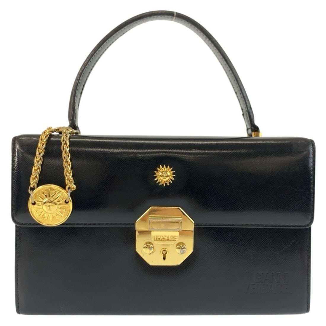 VERSACE Sunburst Black Patent Leather Handbag Vanity Bag for Women: --- Catalog ---Category: SizeSize (HxWxD): 14cm x 23cm x 10cm / 5.51'' x 9.05'' x 3.93''Category: DesignType: Handbag, Vanity bagColor: BlackGender: WomenMaterial: Patent leather Hardware Color: GoldC