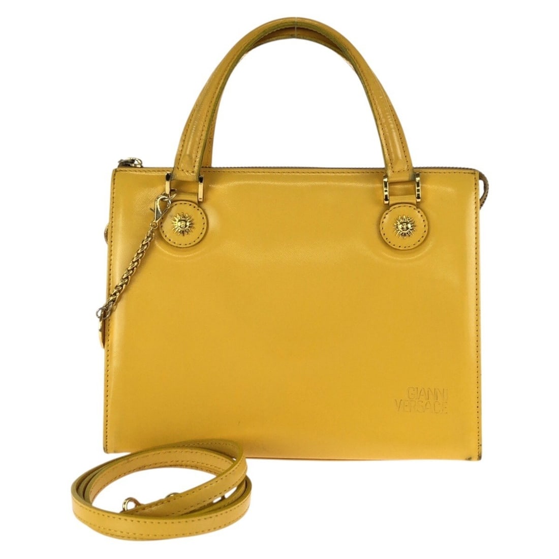 VERSACE Vintage Sunburst 2-way Yellow Leather Handbag/Shoulder Bag with Gold Hardware for Women: --- Catalog ---Category: SizeSize (HxWxD): 20cm x 14.5cm x 12cm / 7.87'' x 5.7'' x 4.72''Category: DesignType: Handbag, Shoulder bagColor: YellowGender: WomenMaterial: Leather Hardware Color: GoldCate
